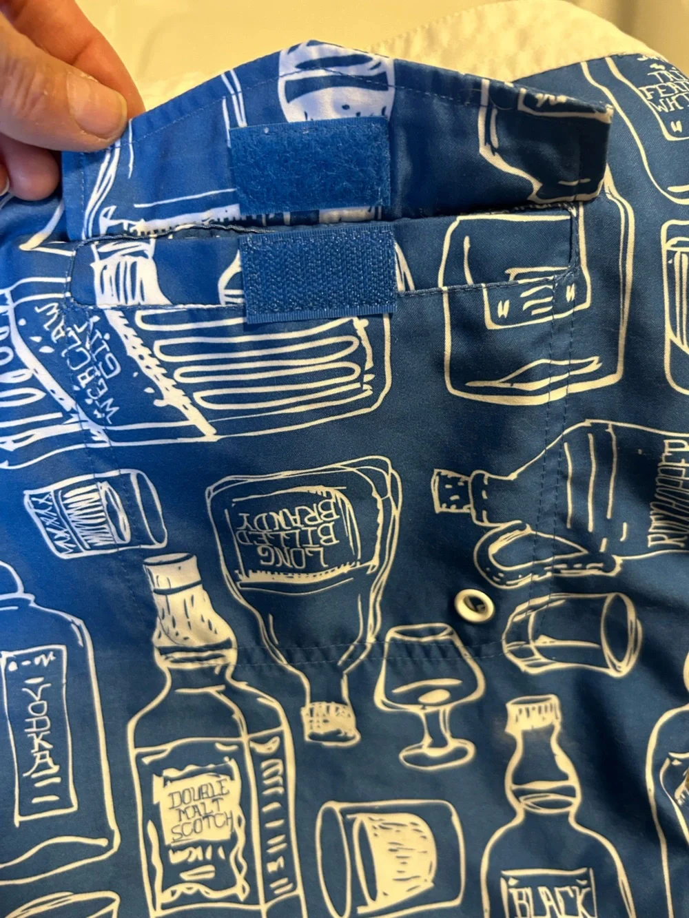 Penguin blue men’s swim trunk alcohol bottles, size 34